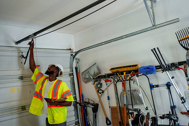 Professional Garage Door Panel Replacement technician working in Millersburg, OR
